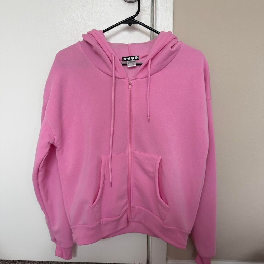 Pink zip-up hoodie in a size L